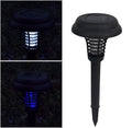 Black solar insect killing lamp with white and purple lights for garden pest control