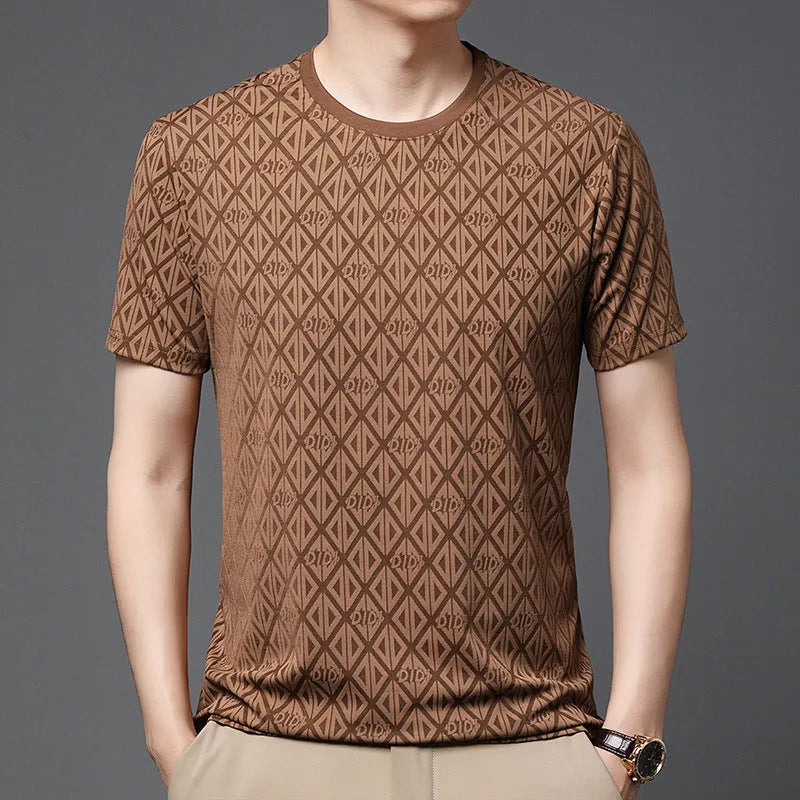 Man wearing a loose fit black Jacquard short sleeve T-shirt with a round neckline.