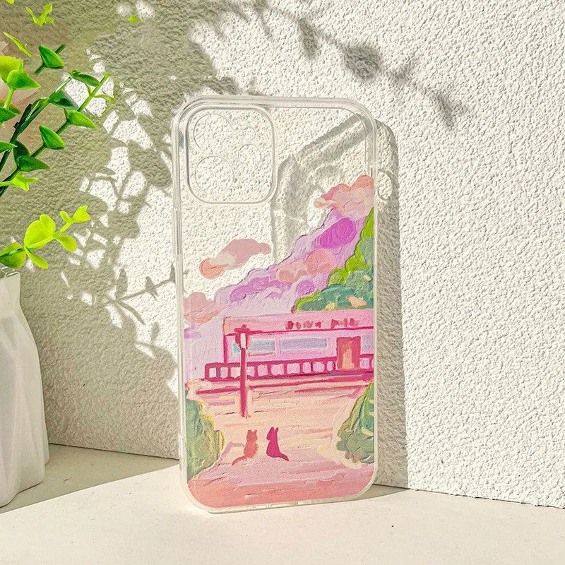 White silicone iPhone case with a colourful cartoon illustration of two cats on the back.