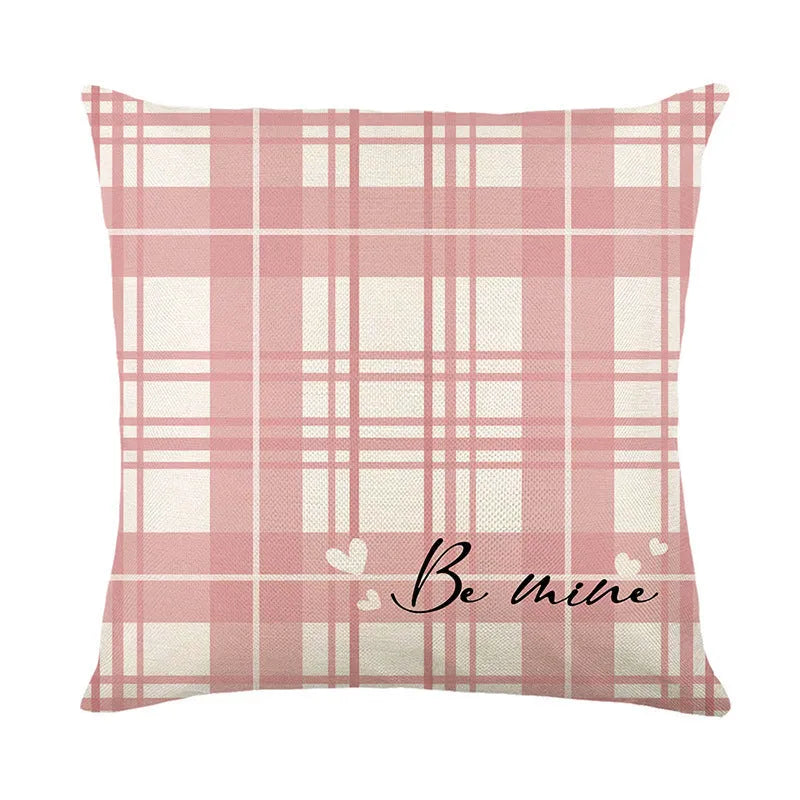Square plaid pillow cover with red heart prints, shown in multiple colour variations.