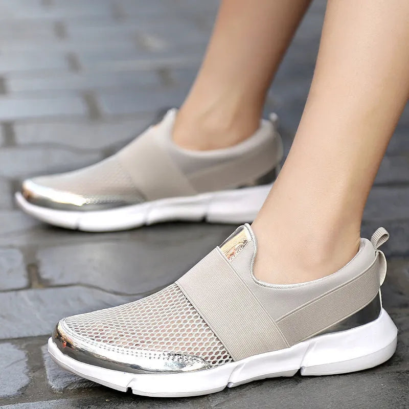 Women's low-top casual sneakers in blue with mesh interior and lightweight construction