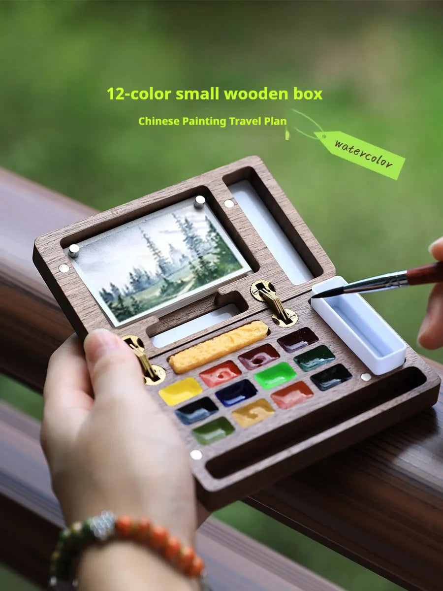 Mini walnut wood watercolour paint box with basic artist pigments and portable design