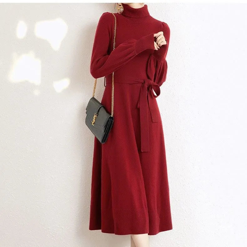 Turtleneck knit dress with elastic waist and loose hem in polyester fabric, shown in solid colour options
