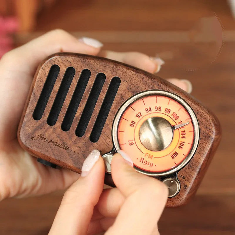Retro wooden wireless mini Bluetooth speaker in cherry wood or walnut finish measuring 111.6mm x 50mm x 68mm
