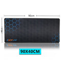 Silk surface desk mouse pad with non-slip rubber base in three size options on office desk