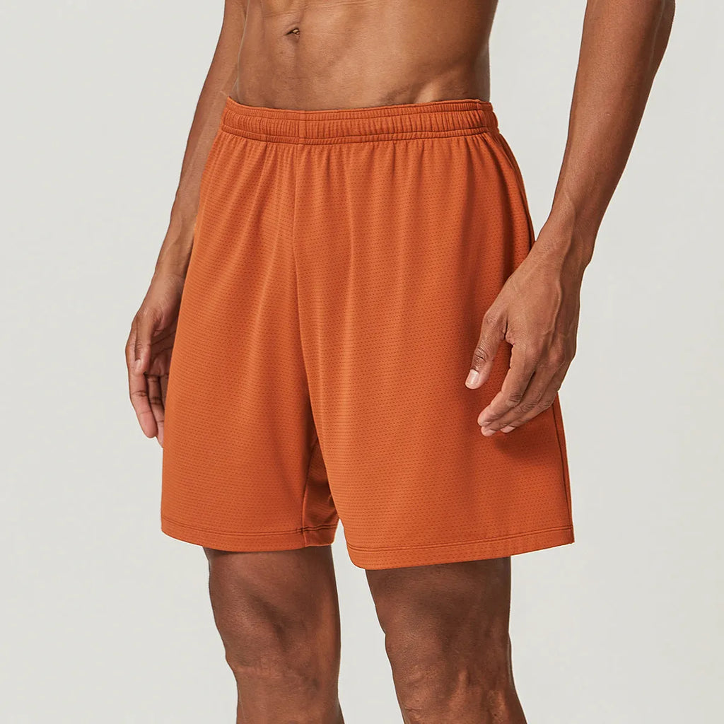 Men's quick-drying double-layer running shorts in khaki colour, showing mid waist and short length design.