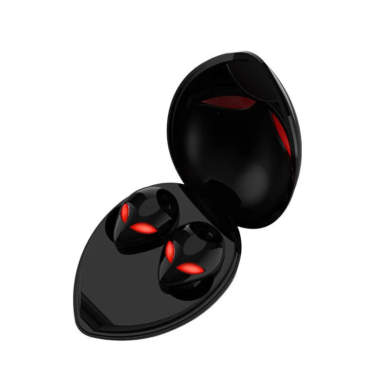 Creative Outer T8 Starman alien design Bluetooth headset with red LED lights and charging case.