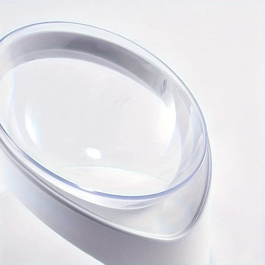 White clear elevated plastic cat food bowl with anti-vomit tilt design.