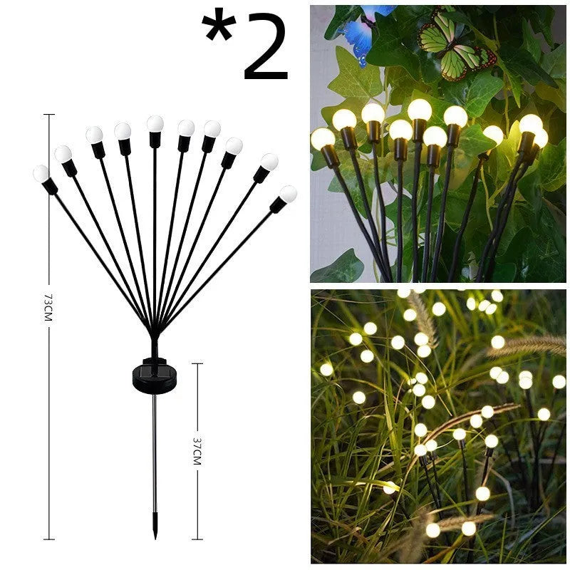 Solar LED firefly garden light with ground spike in warm white or coloured light options