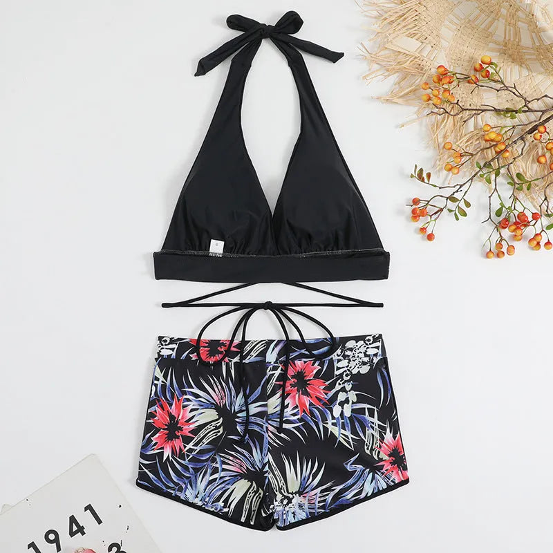 High waist split bikini in nylon with polyester lining, shown in peacock green, red, or black, sizes S to XL