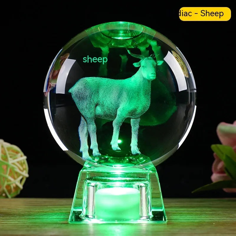 White crystal zodiac ornament with electronic luminous base showing Chinese animal design