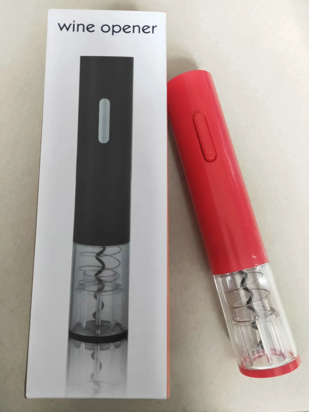 Automatic electric wine bottle opener with foil cutter in black, red, or white colours.
