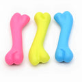 TPR rubber dog bone chew toy for puppies, 20g bite resistant molar toy in random blue, pink or yellow.