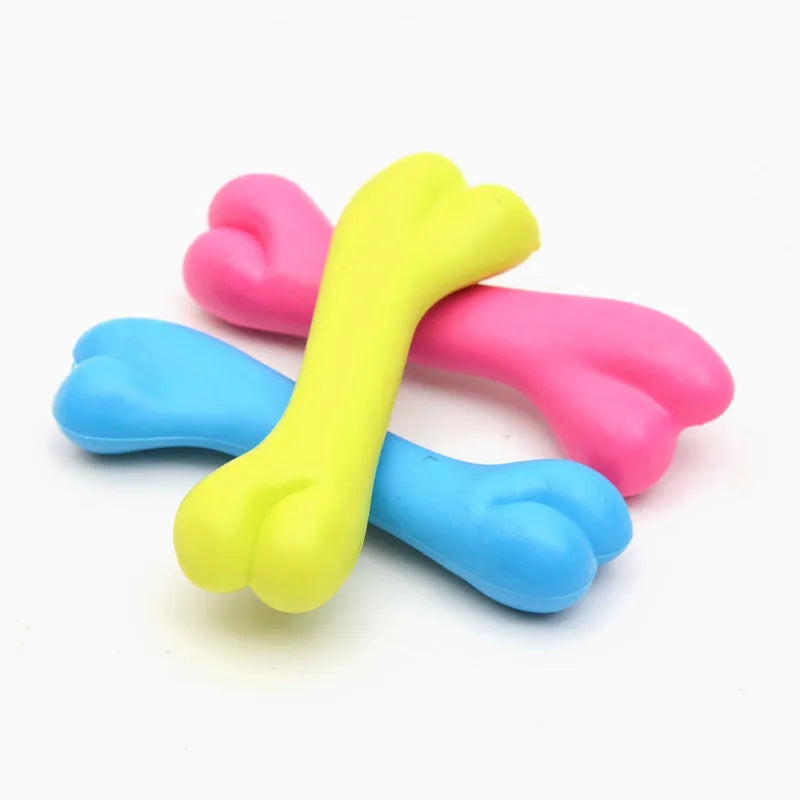 TPR rubber dog bone chew toy for puppies, 20g bite resistant molar toy in random blue, pink or yellow.