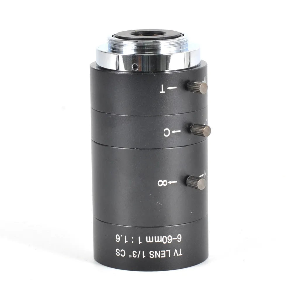 Black manual aperture 6-60mm CCTV camera lens with CS mount on a grey background