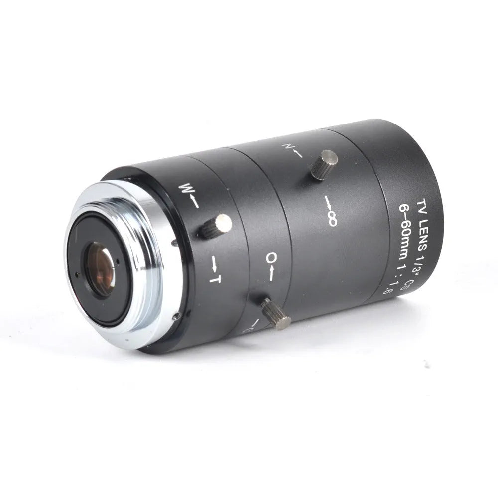 Black manual aperture 6-60mm CCTV camera lens with CS mount on a grey background