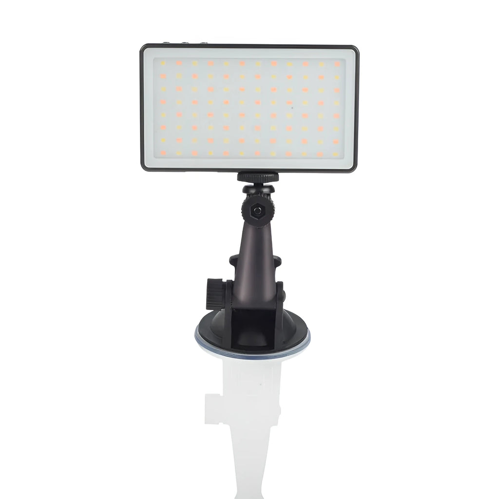 Black aluminium LED video conference light with 96 LEDs and a display screen, shown next to a laptop.