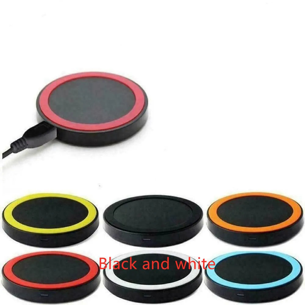 Square 69mm wireless charging pad in a choice of six colours on a desk next to a mobile phone.