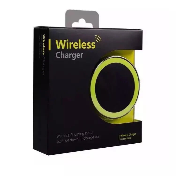 Square 69mm wireless charging pad in a choice of six colours on a desk next to a mobile phone.