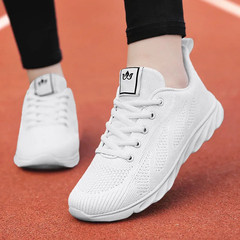 Women's high top casual sneakers in white with back lacing and cross binding straps