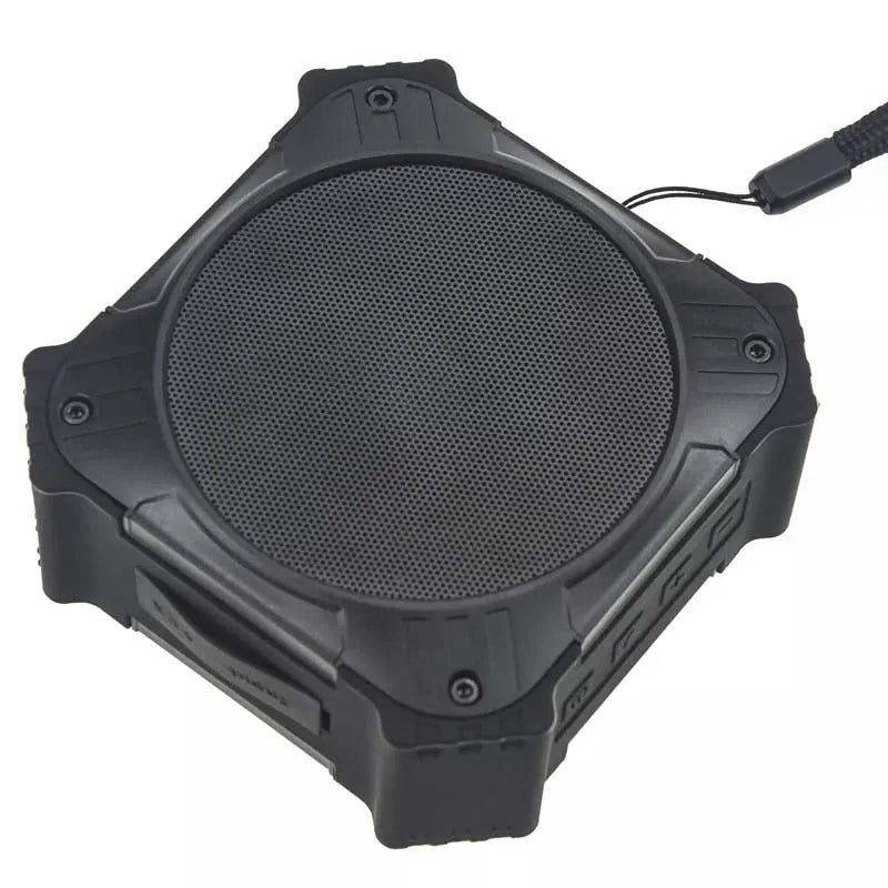 Compact black waterproof Bluetooth speaker with wrist strap showing 101mm dimensions