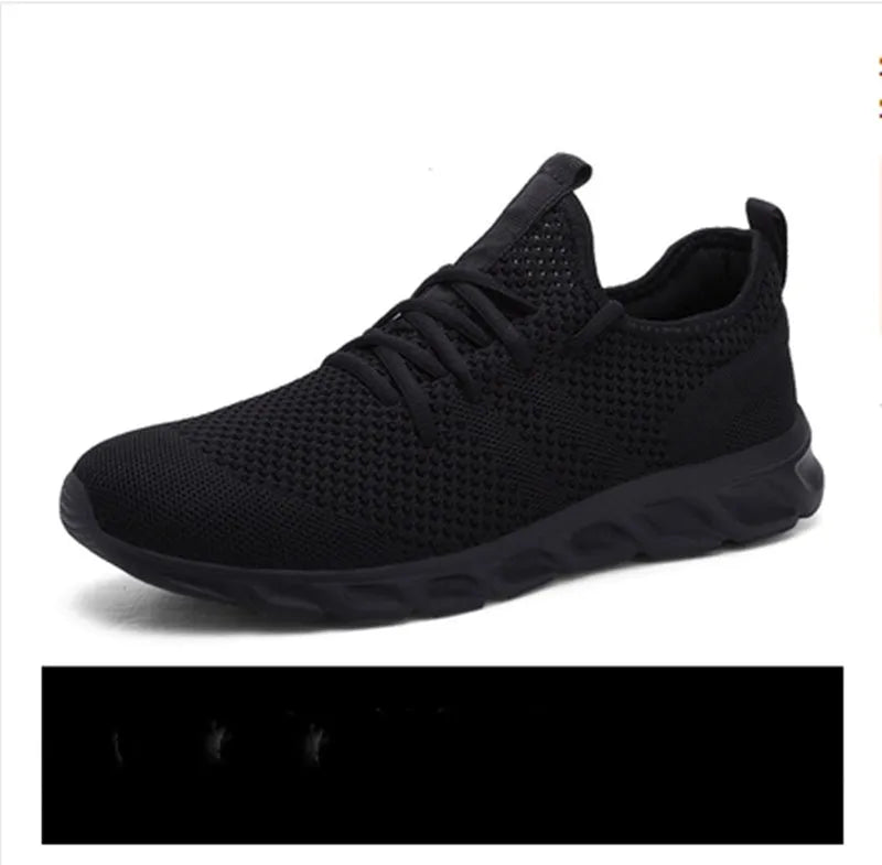 Men's black and white breathable mesh sneakers with round toe and lace-up closure for casual sports