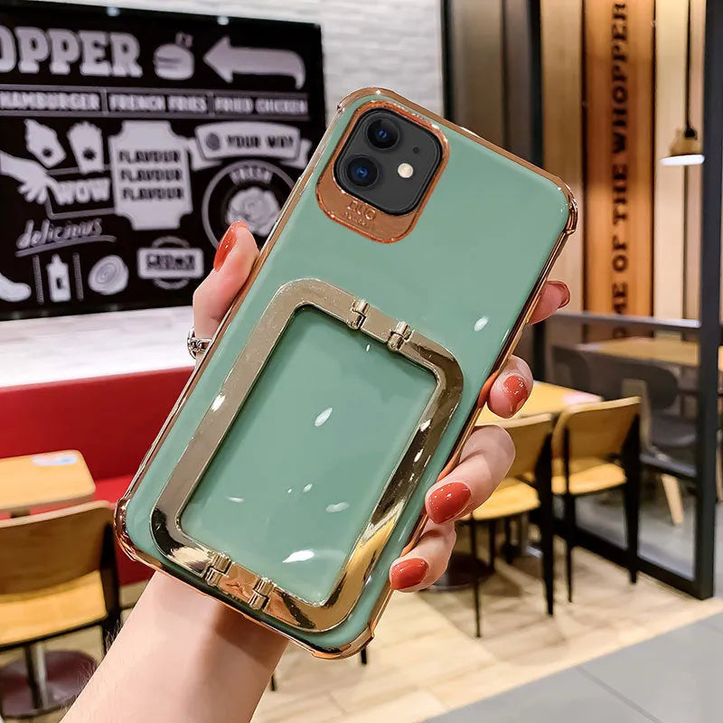 Electroplated silicone phone case for iPhone 12 with net red bracket, shown in Dark Green, Light Green, Orange or Pink.