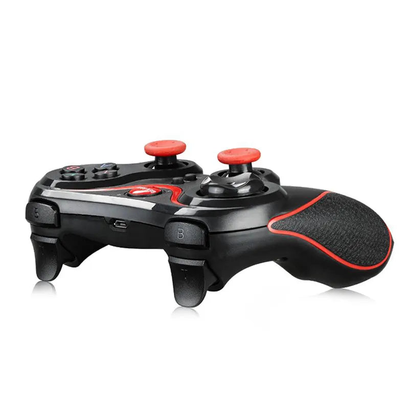 Black wireless Bluetooth gamepad controller for Android and iOS mobile phones on a table
