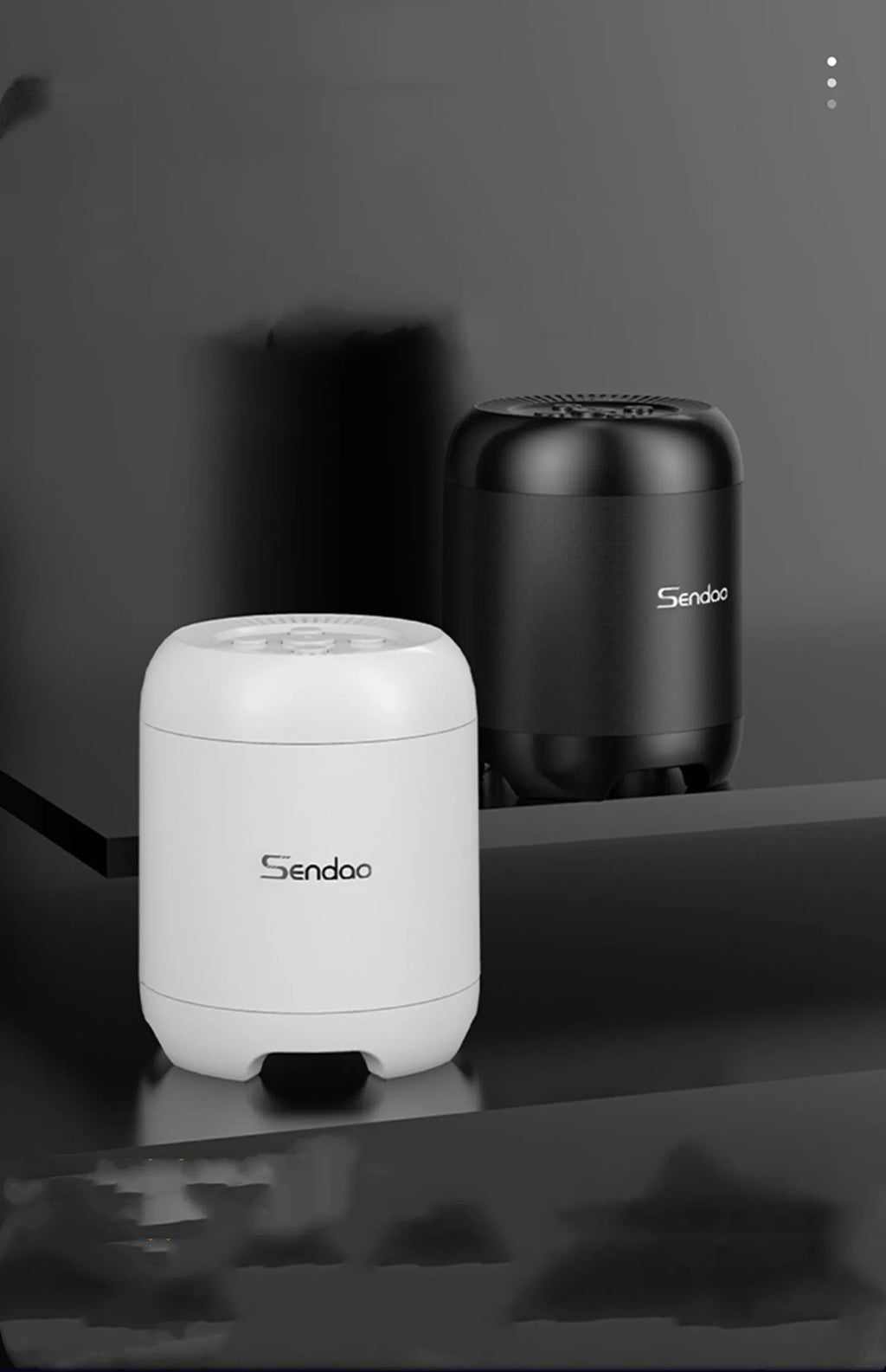 Black or white portable Bluetooth speaker with card reader slot and compact 90x73x73mm dimensions