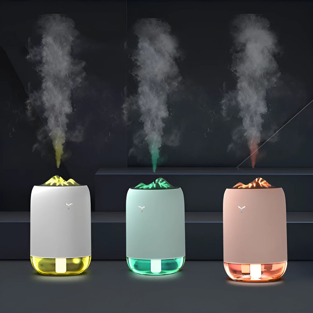 Magic Flame columnar ultrasonic humidifier with USB cable in white, blue, or pink colour options