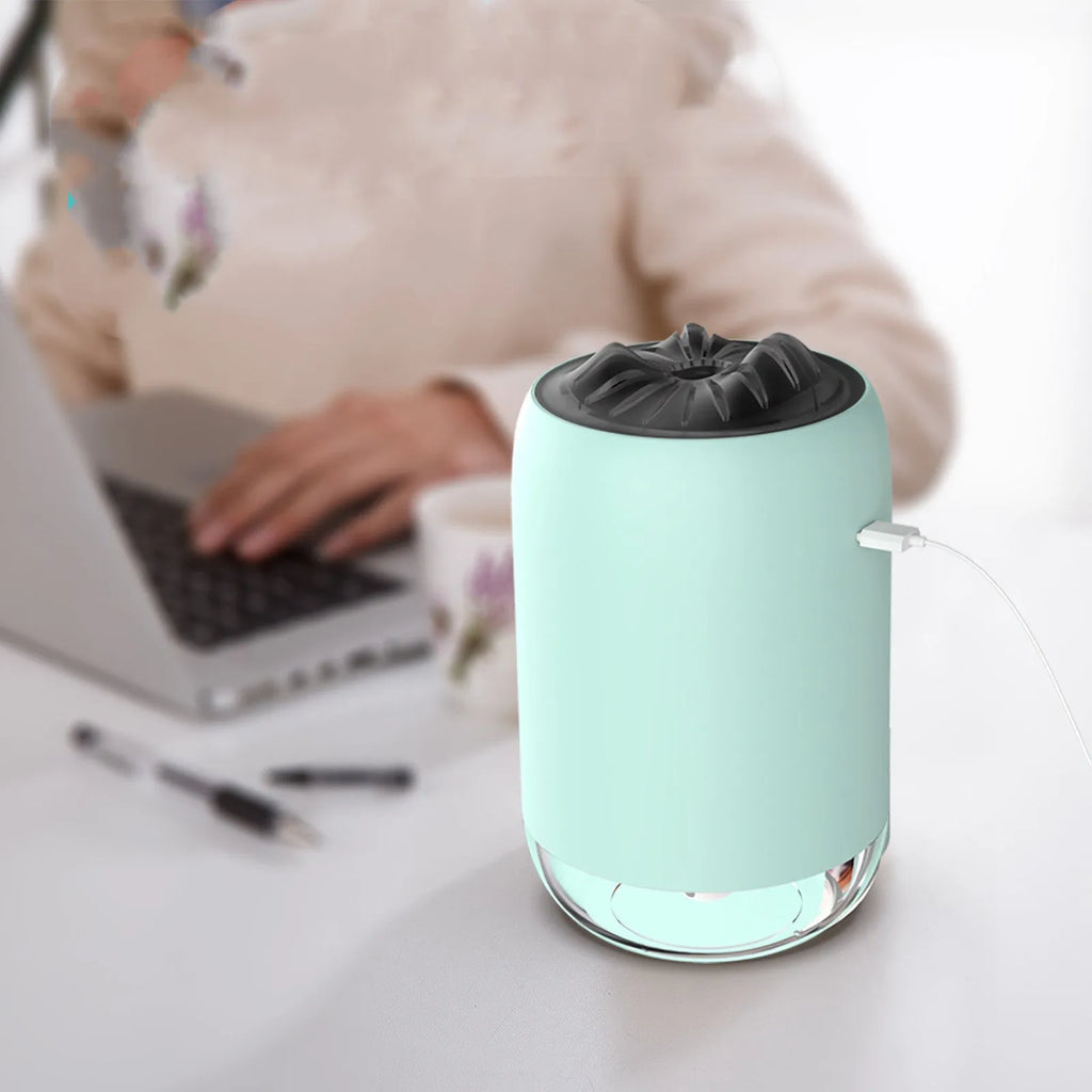 Magic Flame columnar ultrasonic humidifier with USB cable in white, blue, or pink colour options