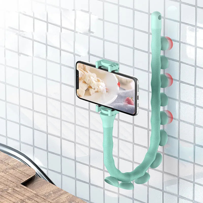 Flexible rubber phone bracket with suction cup showing 360° rotation capability