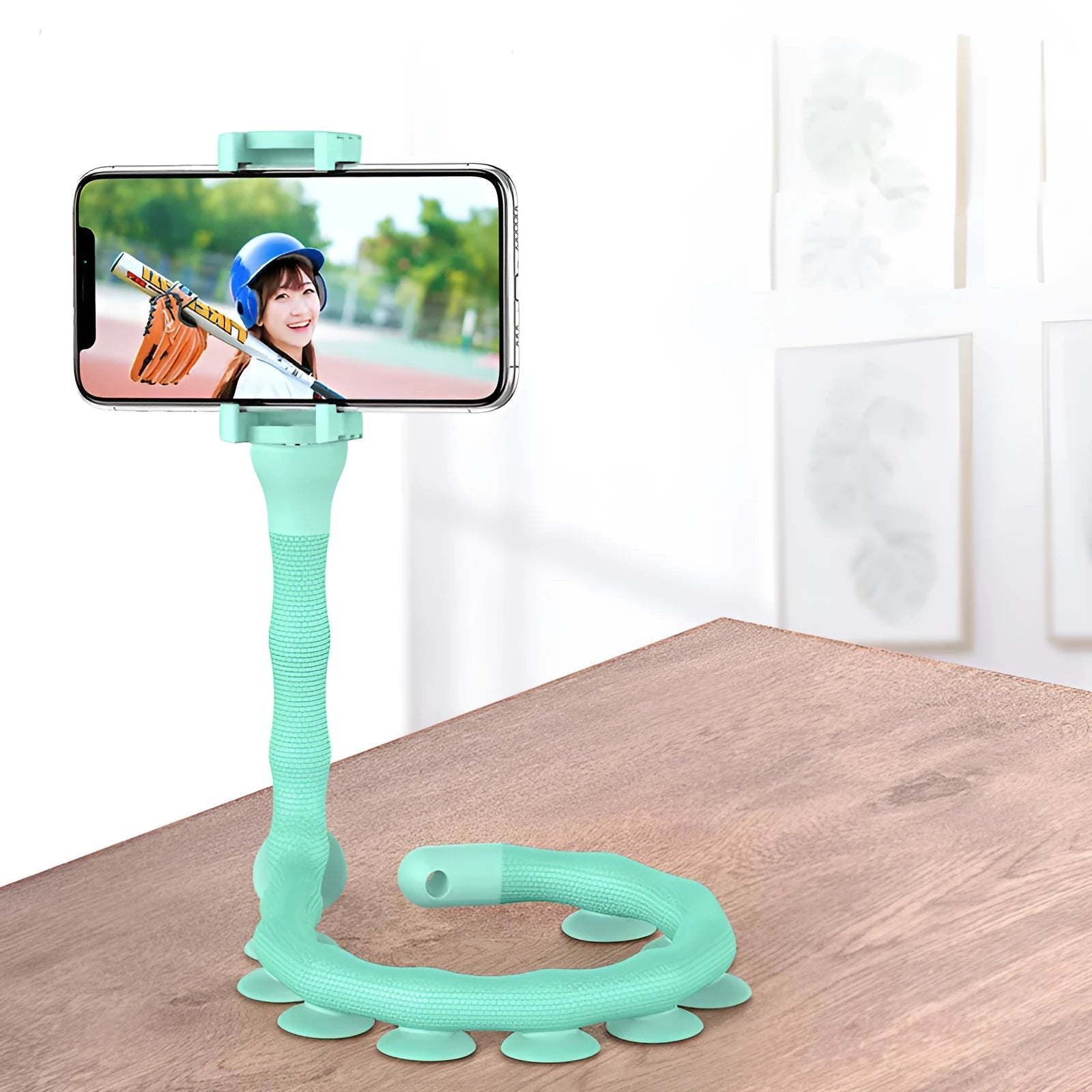 Flexible rubber phone bracket with suction cup showing 360° rotation capability