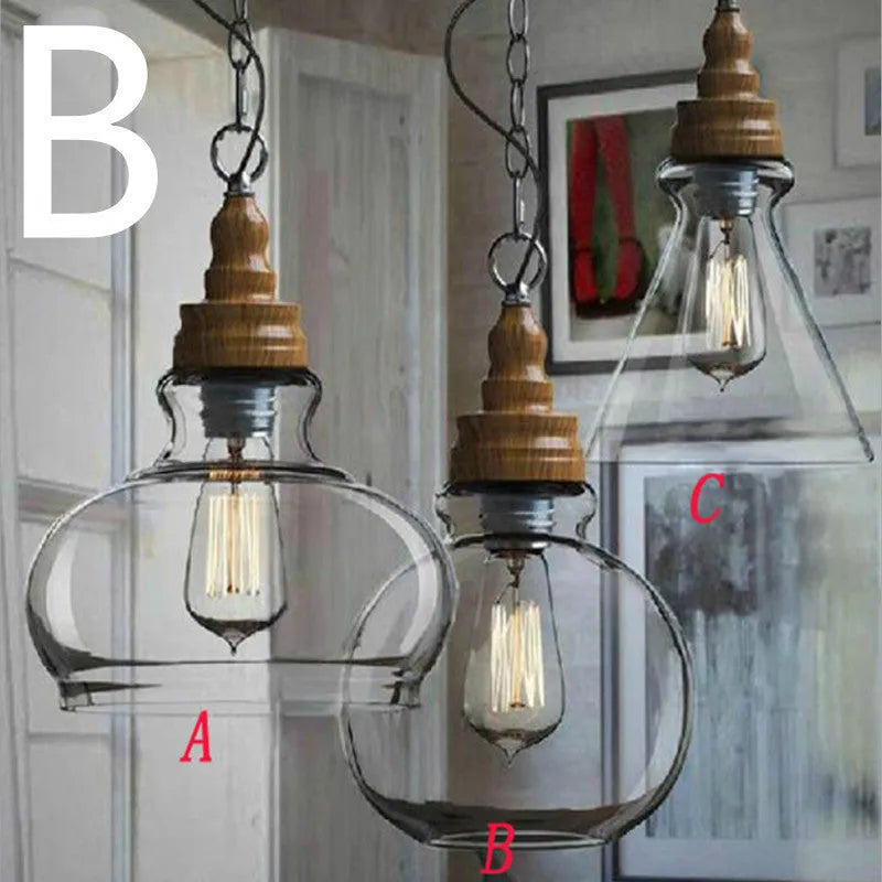 Glass single head pendant light with wood grain finish and adjustable cable, shown in a Nordic style interior.