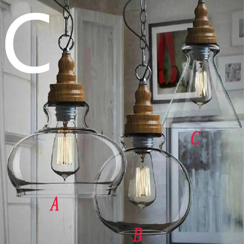 Glass single head pendant light with wood grain finish and adjustable cable, shown in a Nordic style interior.