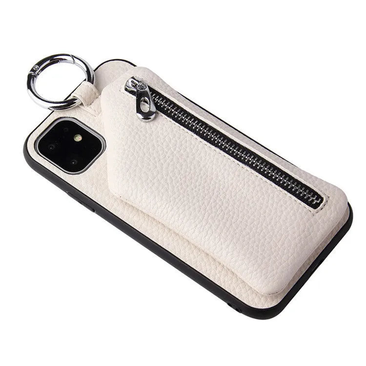 Pink imitation leather phone case with crossbody lanyard and detachable coin purse on an iPhone.
