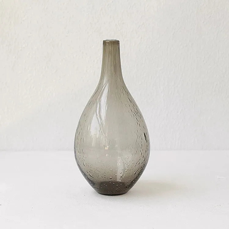 Grey geometric bubble glass vase with textured surface and stained glass construction