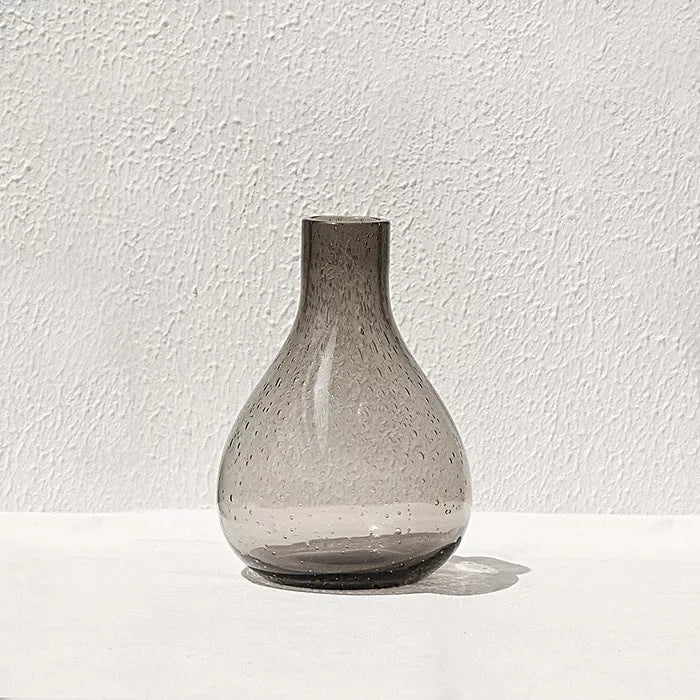 Grey geometric bubble glass vase with textured surface and stained glass construction