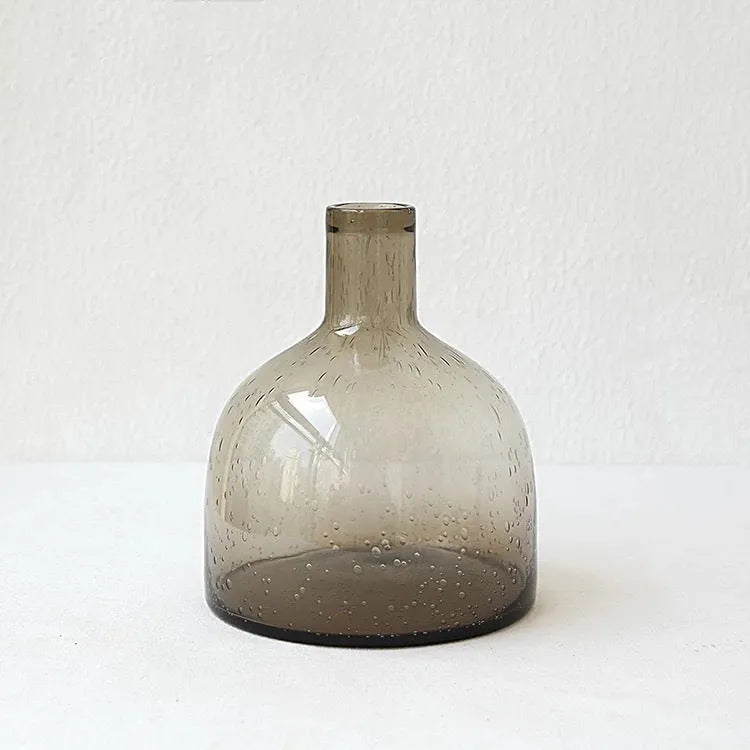 Grey geometric bubble glass vase with textured surface and stained glass construction