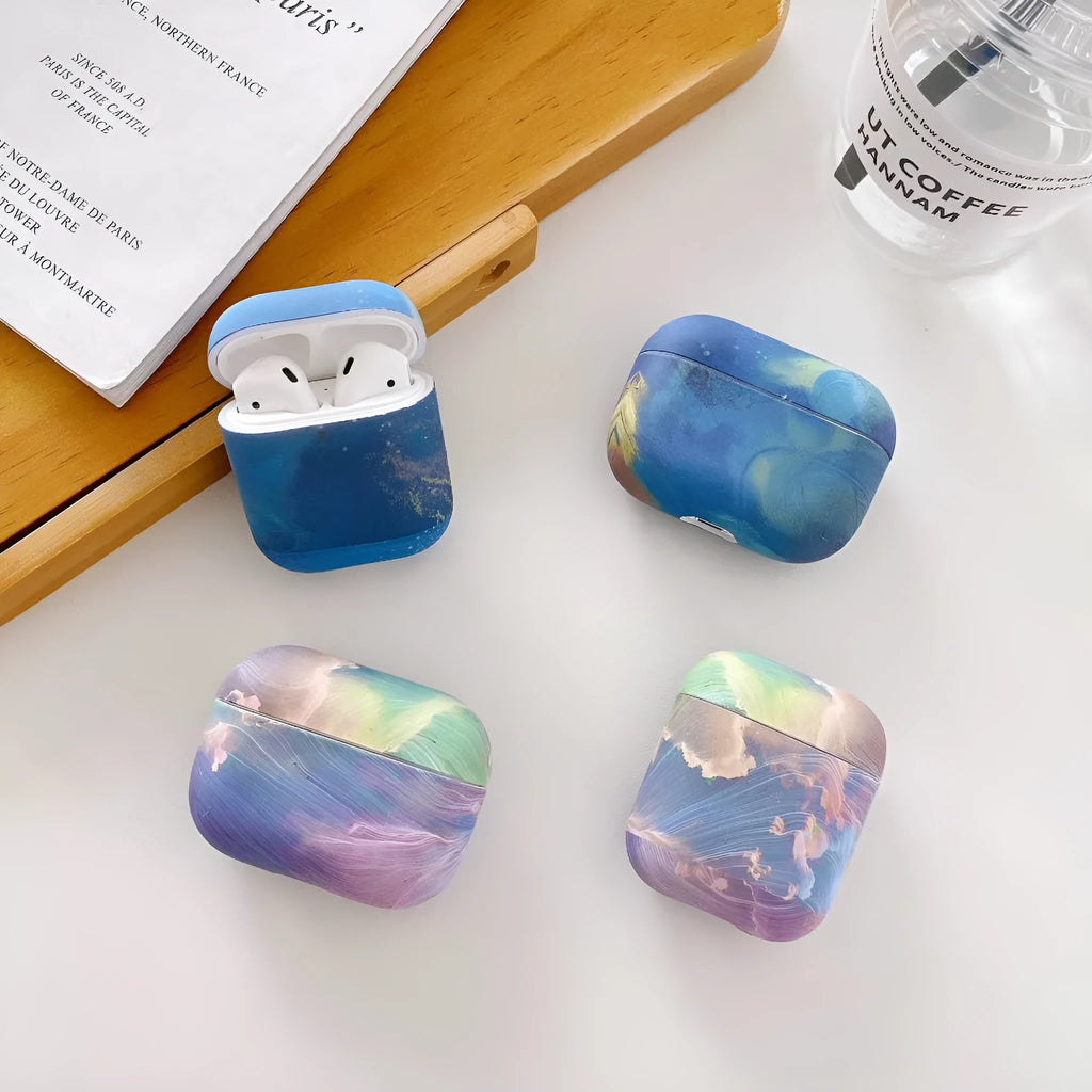 Pink and blue watercolour hard shell protective sleeves for Apple AirPods charging cases