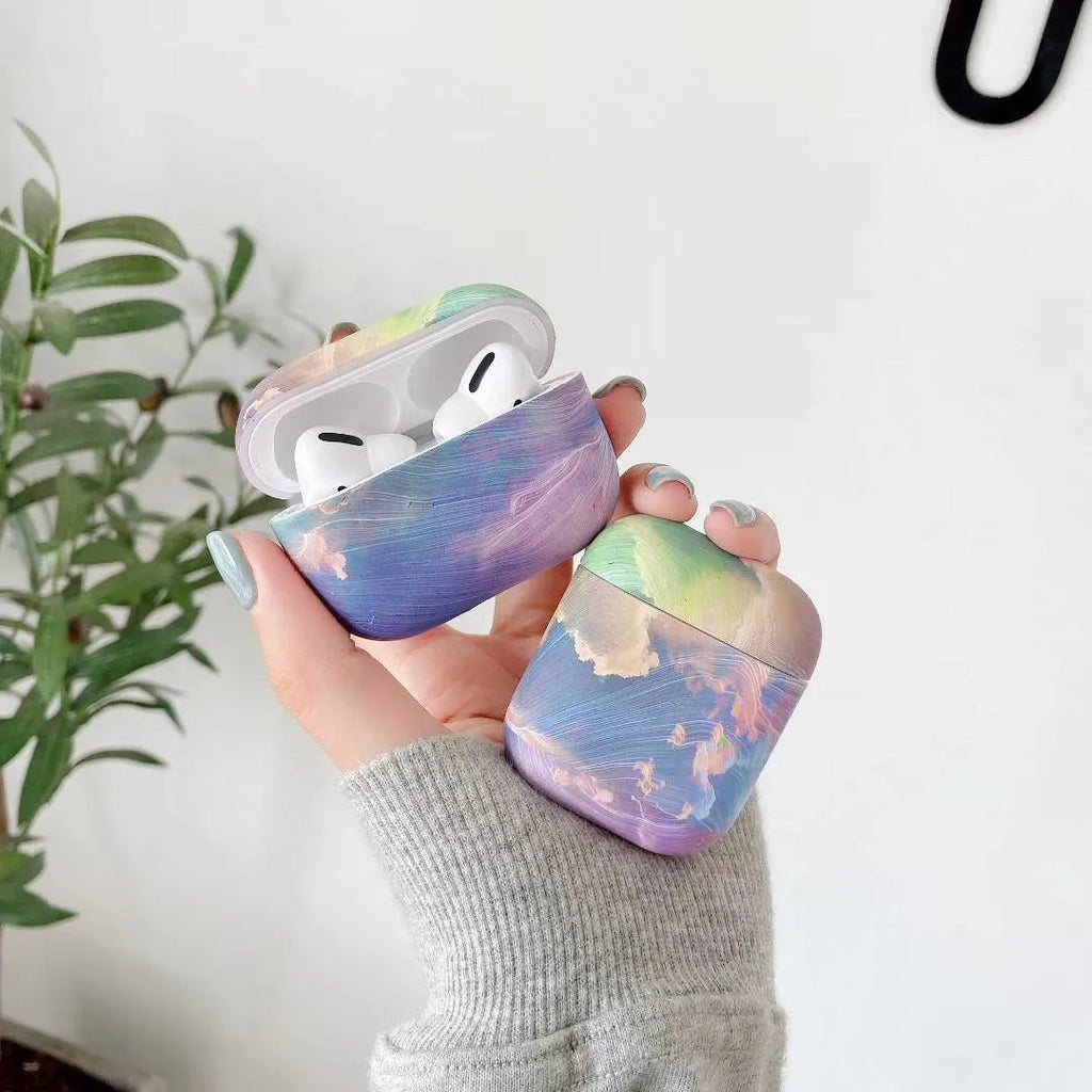 Pink and blue watercolour hard shell protective sleeves for Apple AirPods charging cases