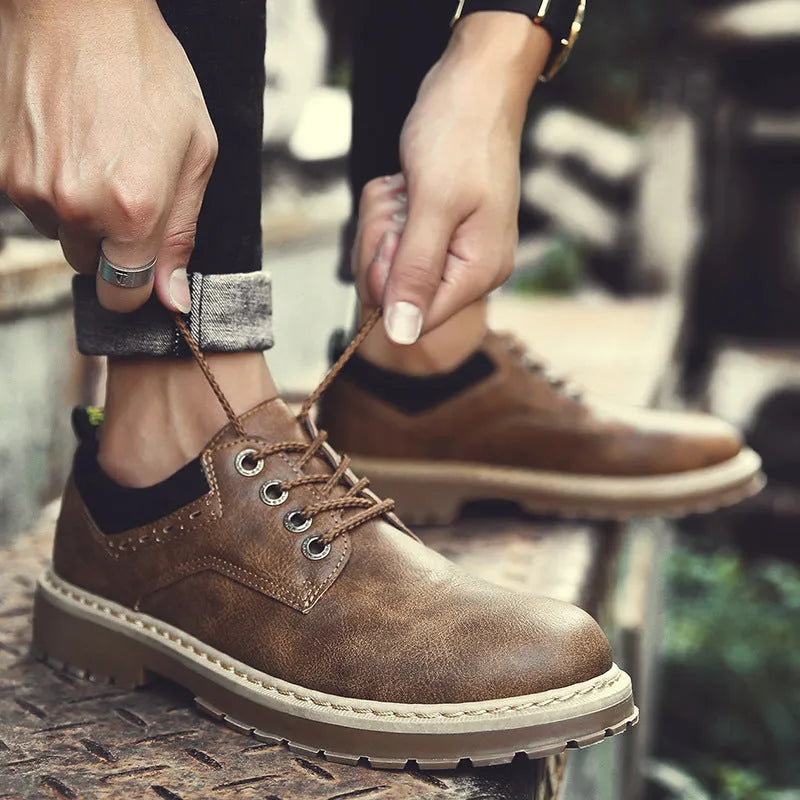 Men's round toe casual shoes in artificial PU, available in black, brown, and dark brown on a rubber sole