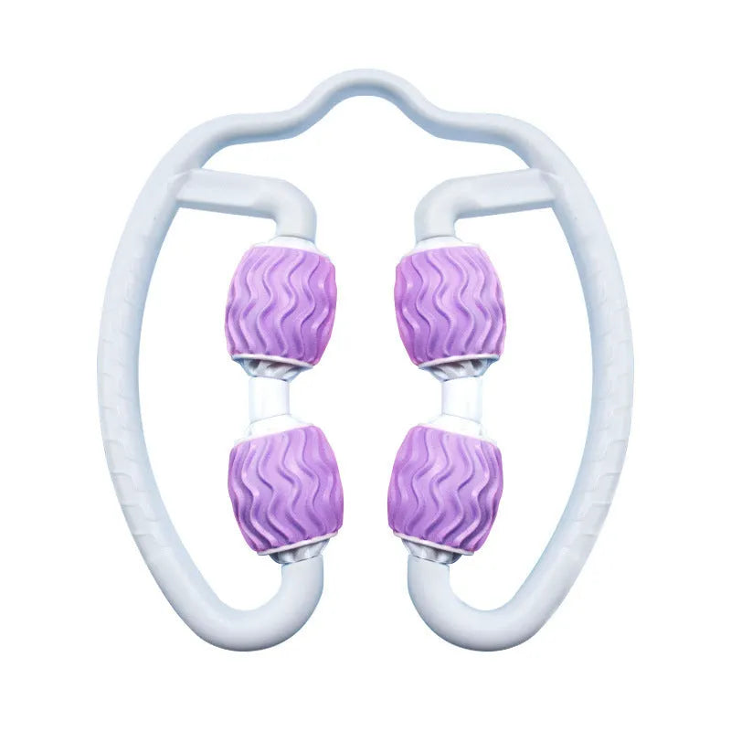 Purple and pink silicone annular leg massage roller on a white background.