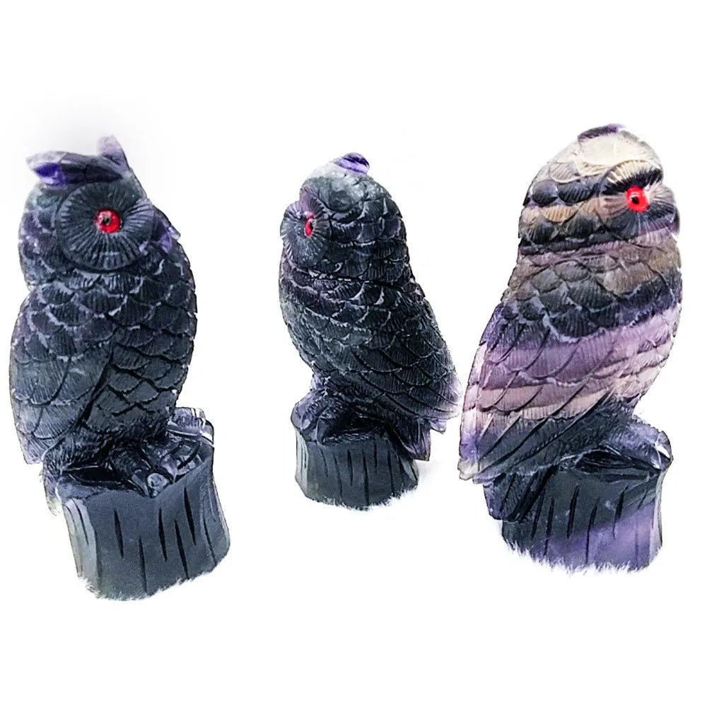 Hand carved purple fluorite owl ornament showing natural stone texture and 4 inch size