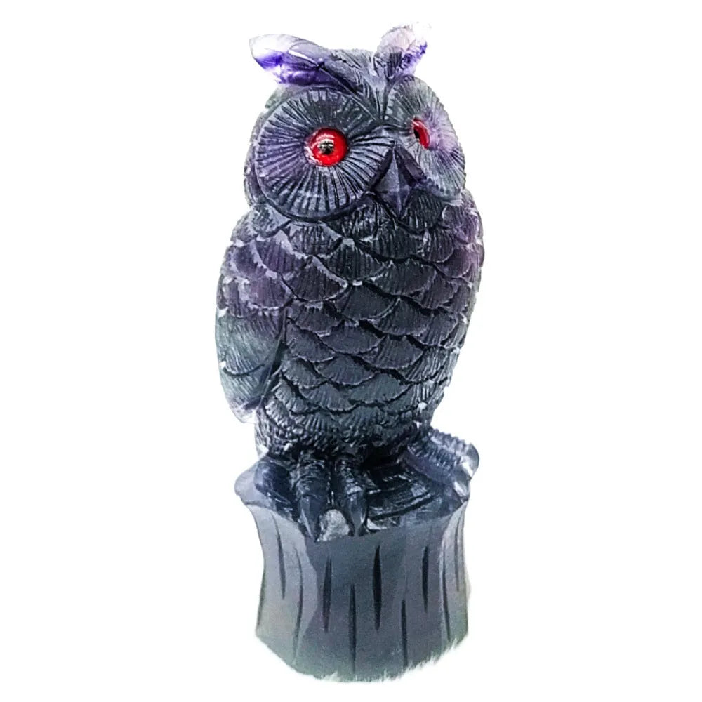 Hand carved purple fluorite owl ornament showing natural stone texture and 4 inch size