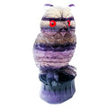 Hand carved purple fluorite owl ornament showing natural stone texture and 4 inch size