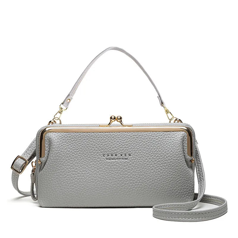 Horizontal square Korean ladies messenger bag in PU leather with a zipper buckle, shown in lilac colour.