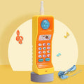 Pink electronic simulation mobile phone toy for babies on a white background.