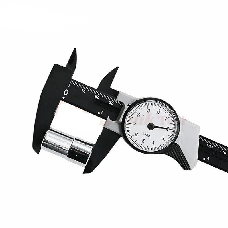 Black and white plastic vernier caliper showing 0-150mm measurement scale.
