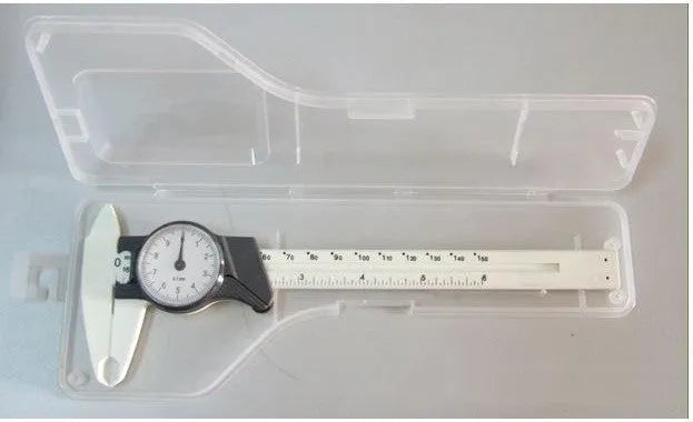 Black and white plastic vernier caliper showing 0-150mm measurement scale.